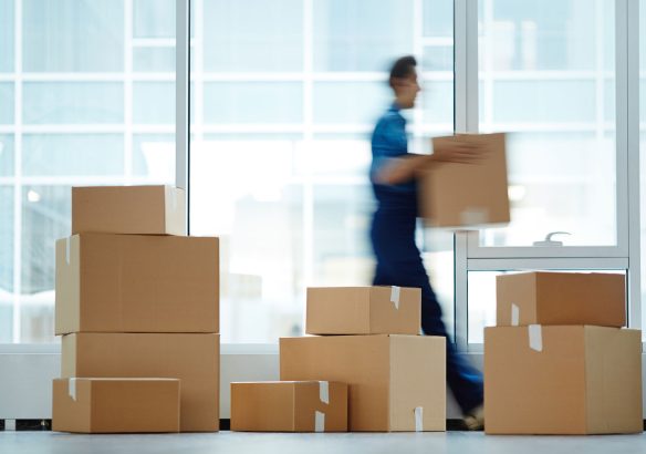 man-moving-boxes Man moving boxes